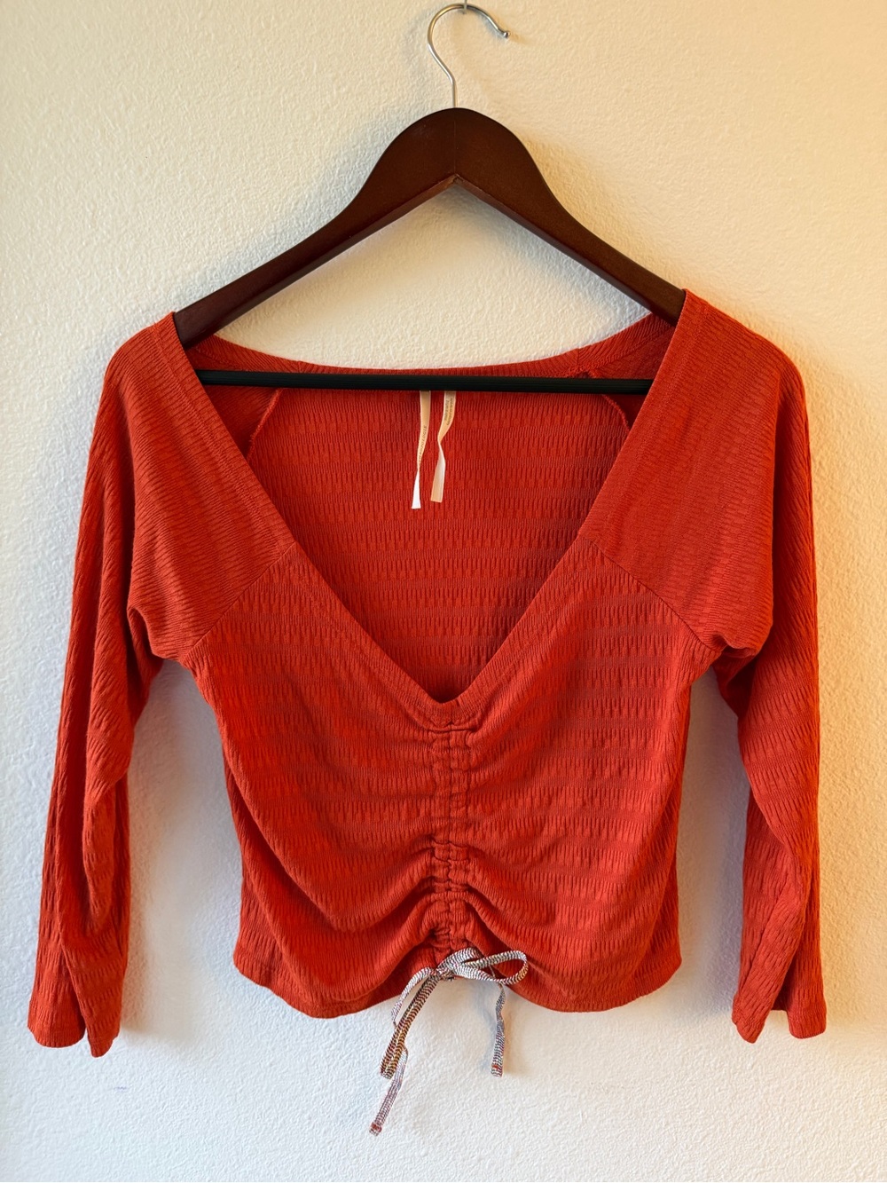 By Anthropologie "Sabrina" Cinched Ribbed Crop Top in orange 
Size: M